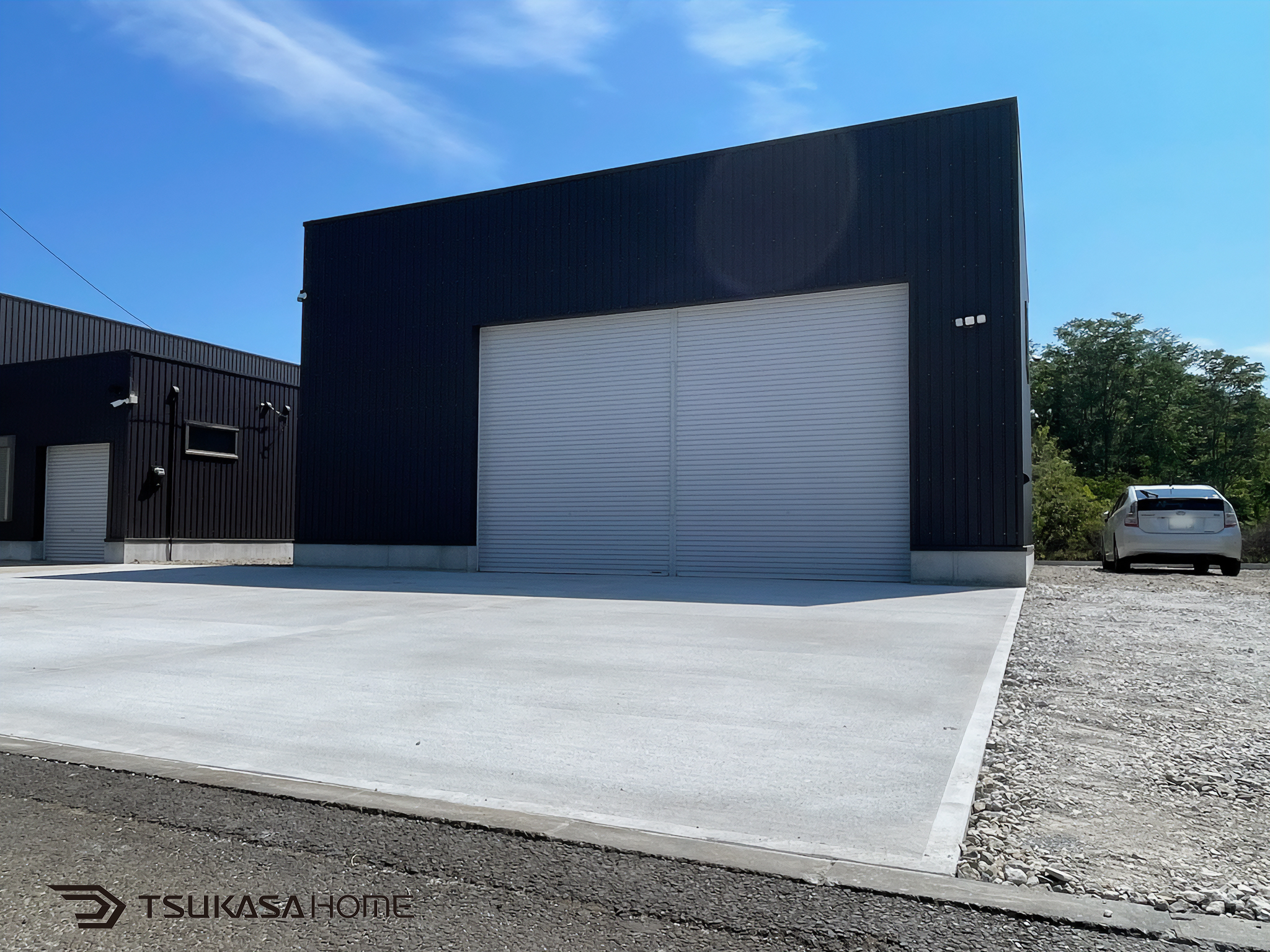 茨城県阿見町で建築した天井高さのあるおしゃれでかっこいい空調設備付き倉庫・作業場の外観画像