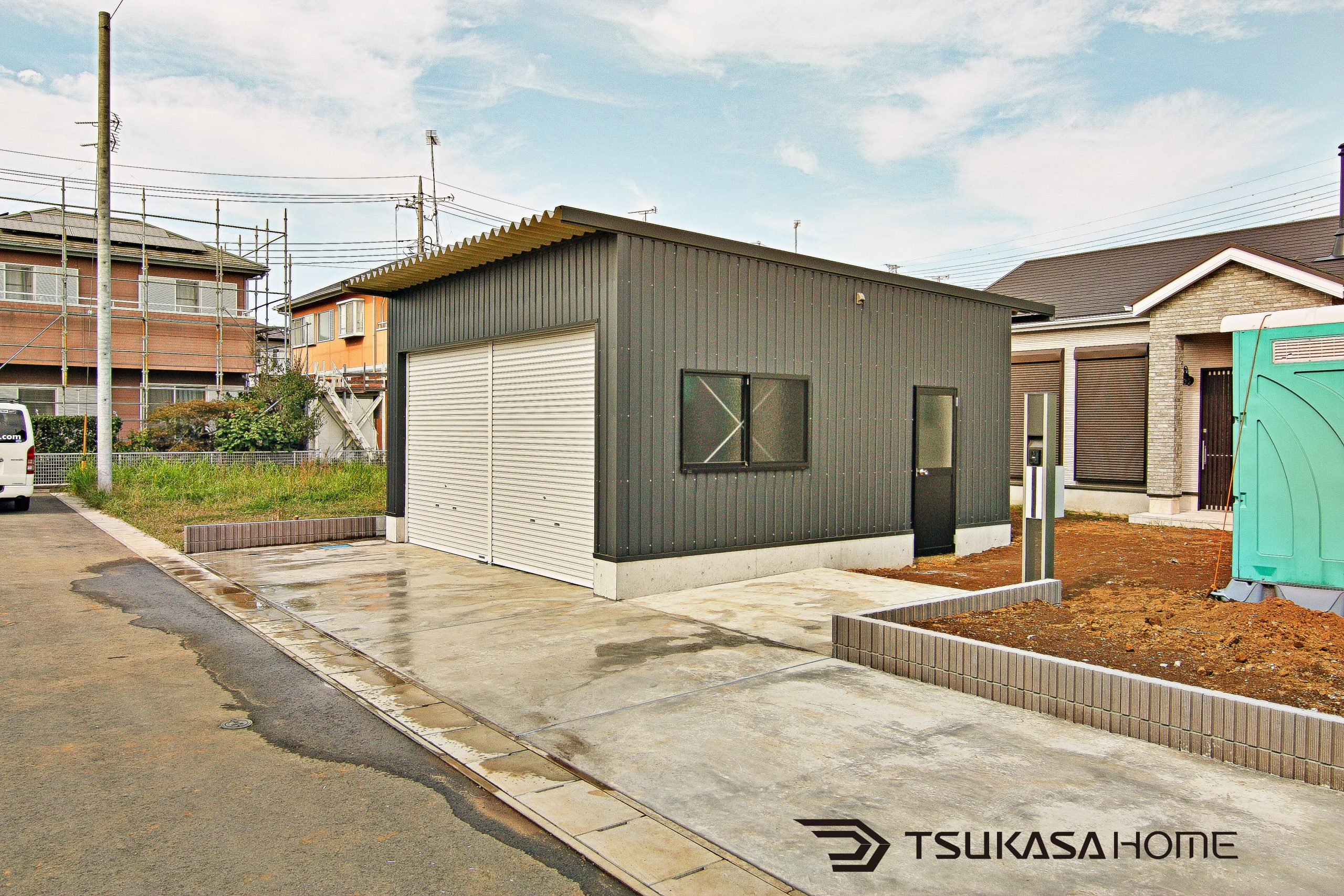 千葉県八街市で施工したおしゃれでかっこいい黒い2台駐車の車庫ガレージ倉庫の外観画像