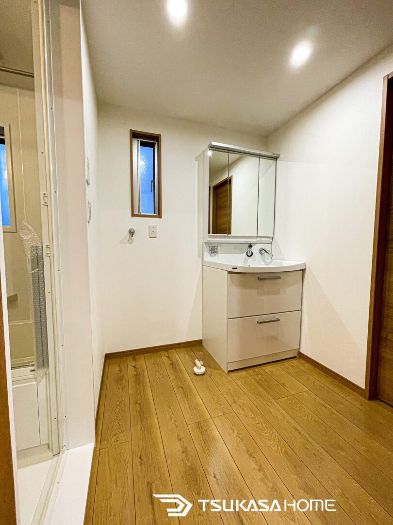 賃貸併用ガレージハウスの脱衣室と洗面